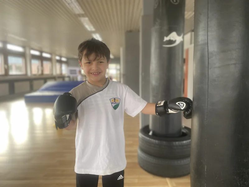 WingTsun Kids Training – Junge lächelt selbstbewusst